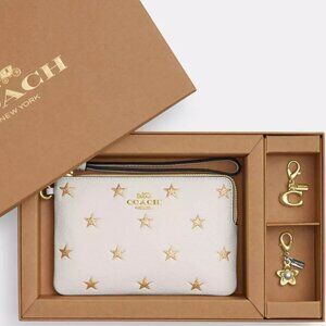 Coach Boxed Corner Zip Wristlet With Star Print And Charms